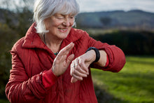Senior wearing the Angel Watch Series R Assist